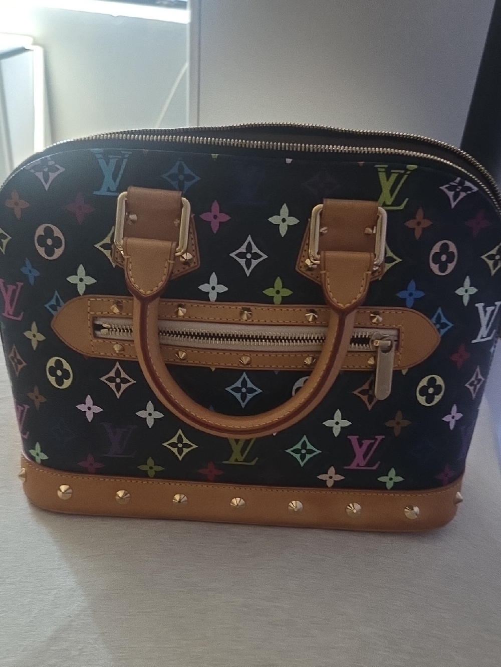 Louis Vuitton Multicolor Monogram Alma Satchel in Black with Tan Trim